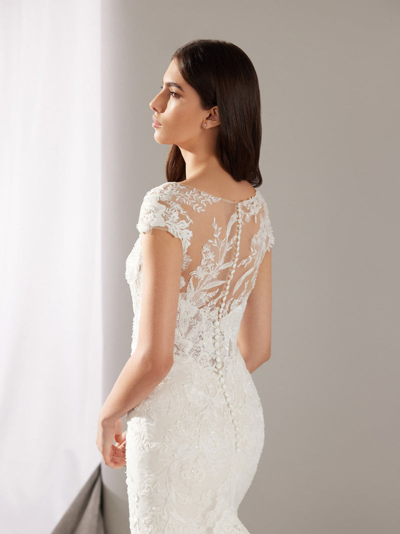 Pronovias Turan Mermaid wedding dress with a sweetheart neckline illusion back